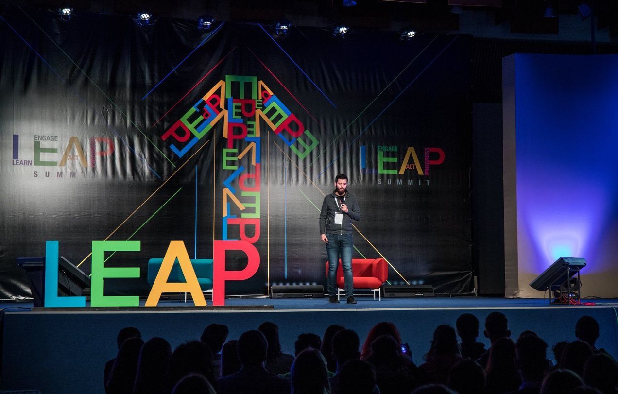 How can conferences help you find your first job in IT?